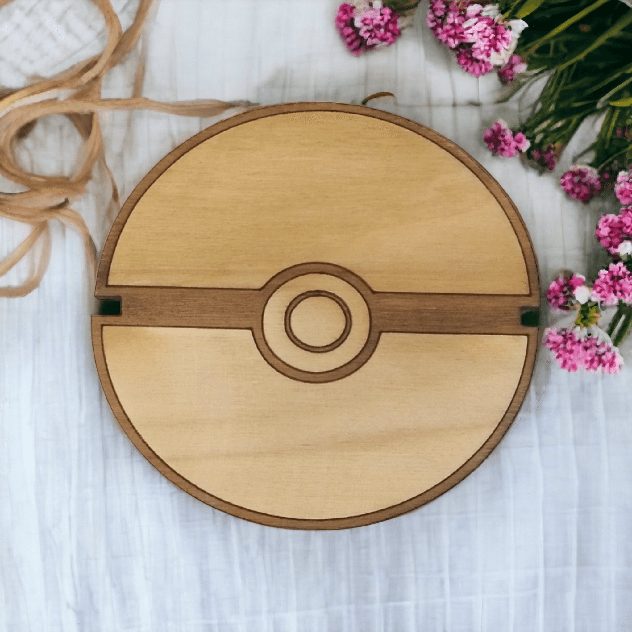 Pokeball wooden coasters displayed as a housewarming gift