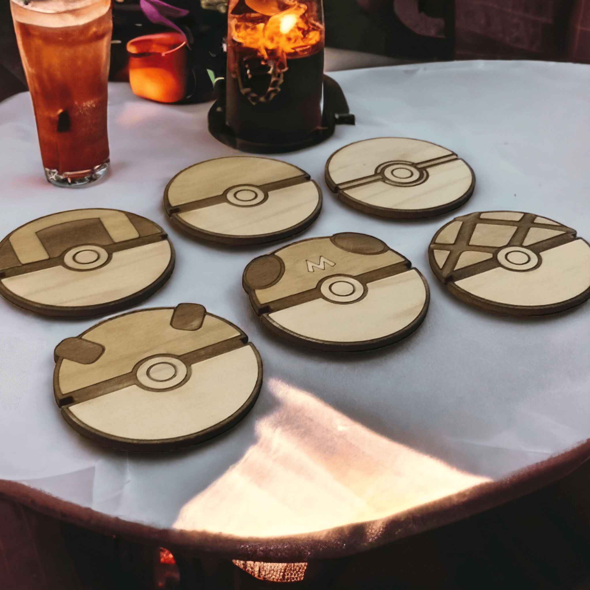 Set of 6 Eco-friendly handmade Pokeball wooden coasters used as kitchenware