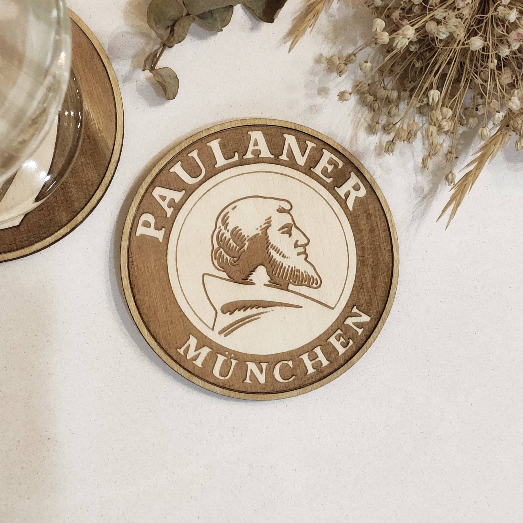 Handmade wooden coasters with Paulaner Munchen beer logo, perfect for housewarming gifts.
