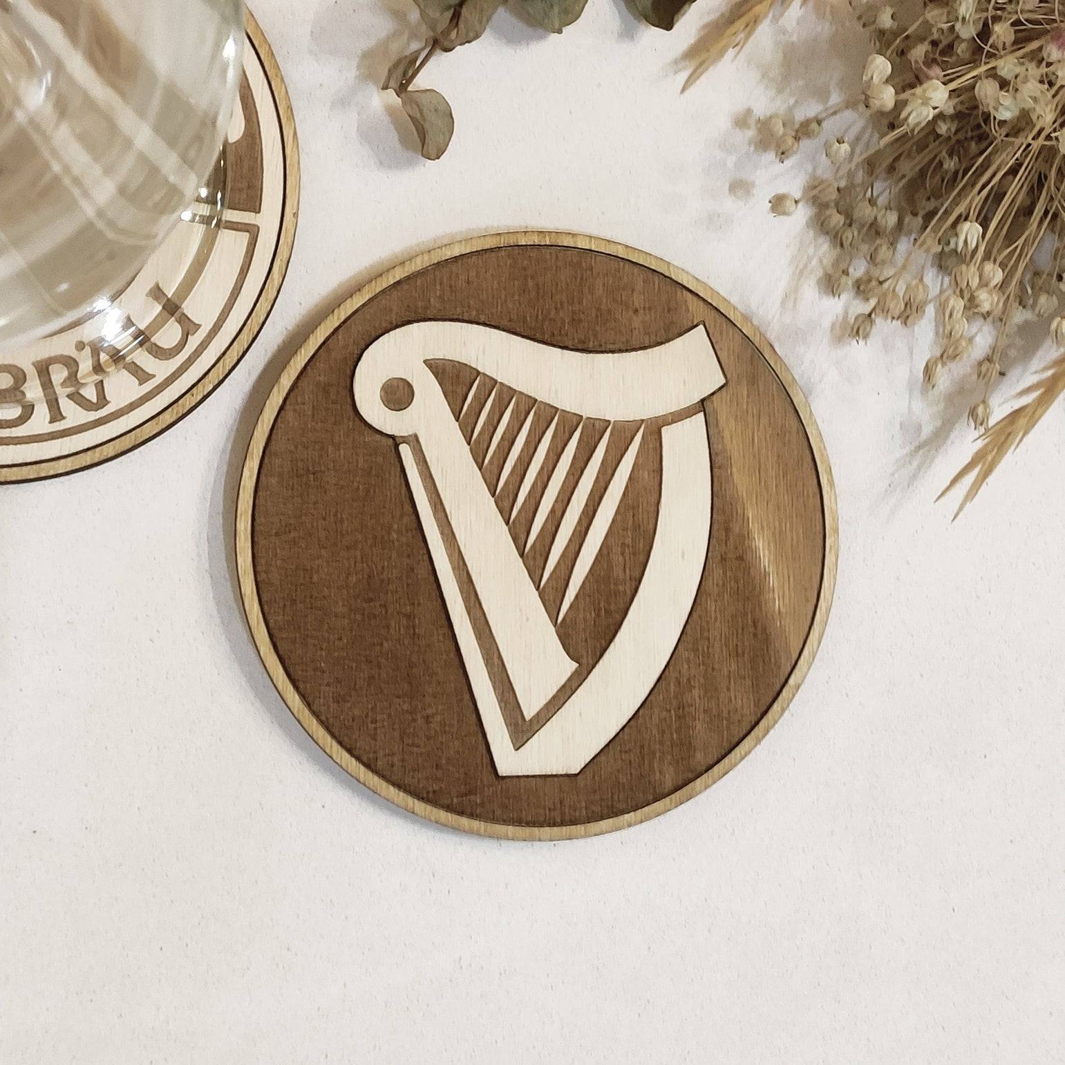 Handmade wooden coaster featuring the Guinness Harp logo - perfect housewarming gift and wood kitchenware.